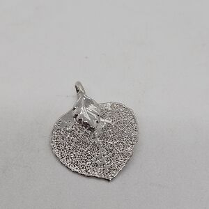 small silver tone metal leaf pendant